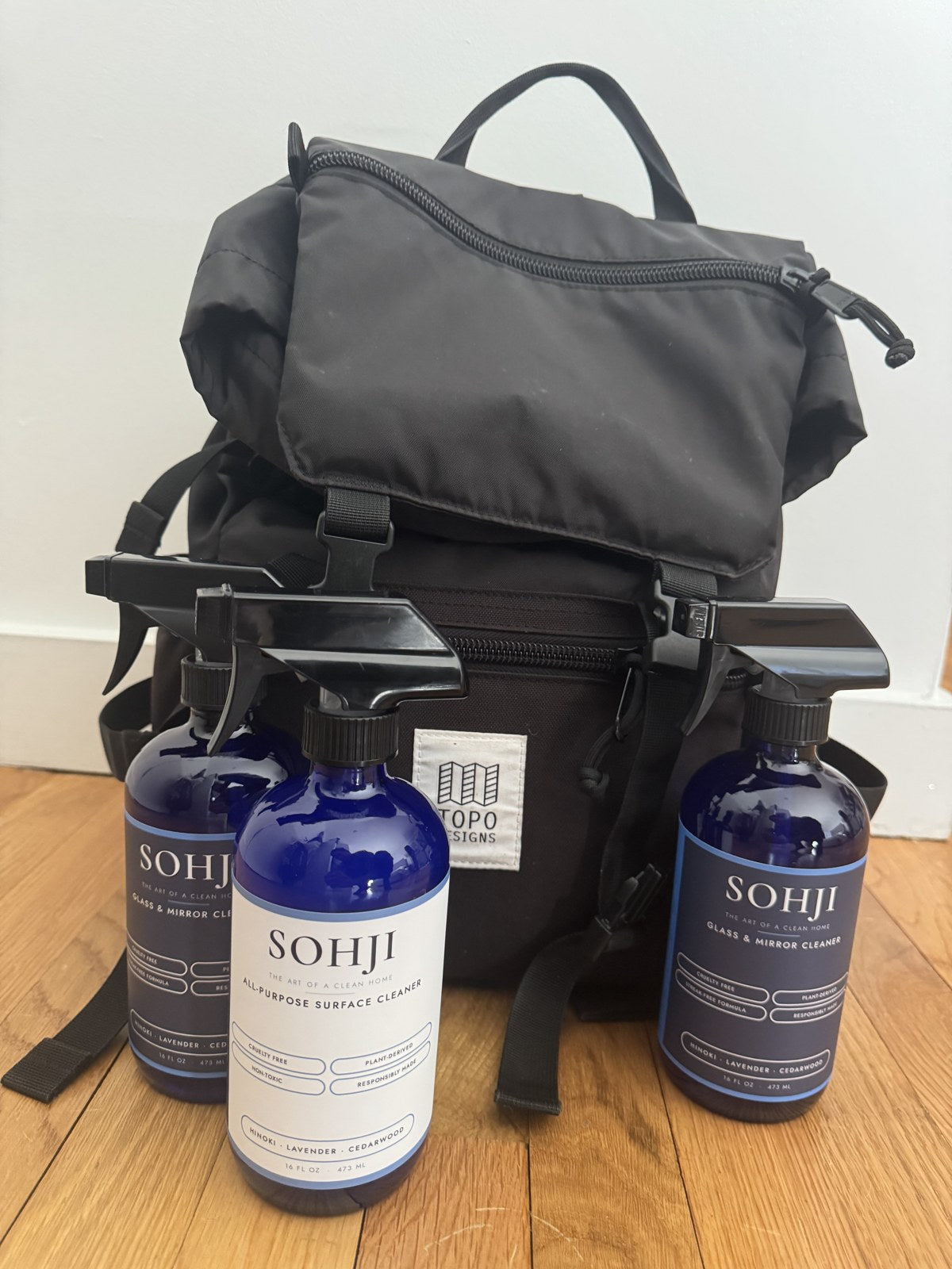 SOHJI cleaners and the backpack used to carry them to NYC stores