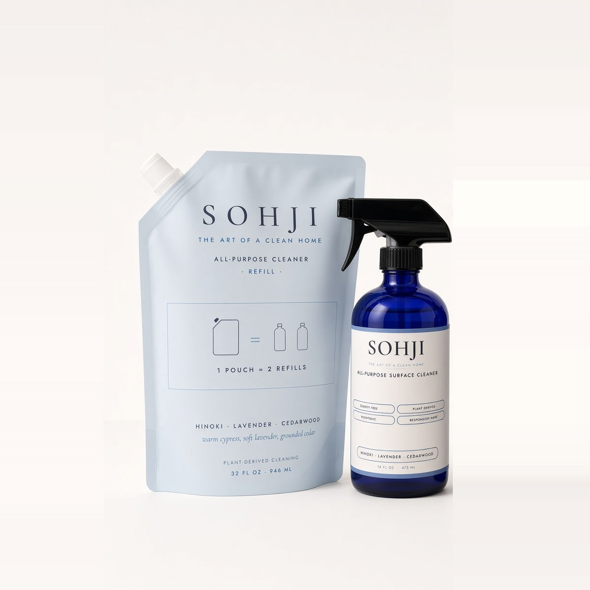 SOHJI All-Purpose Set: All-Purpose Surface Cleaner cobalt glass spray bottle next to its light blue 32 fl oz refill pouch
