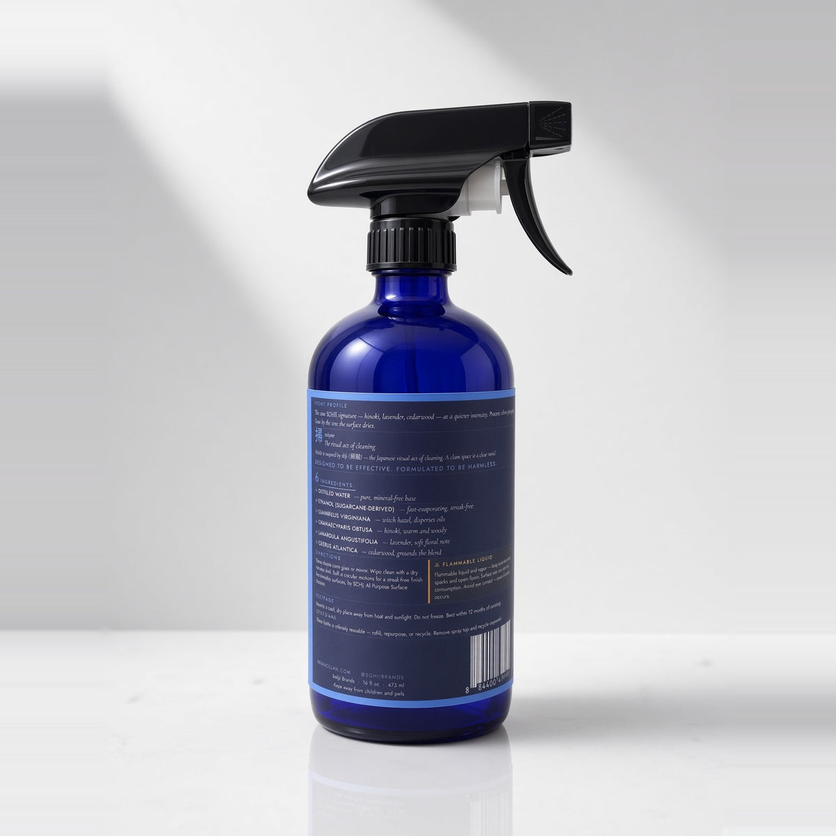 Back label of SOHJI glass and mirror cleaner showing plant-derived ingredients and directions